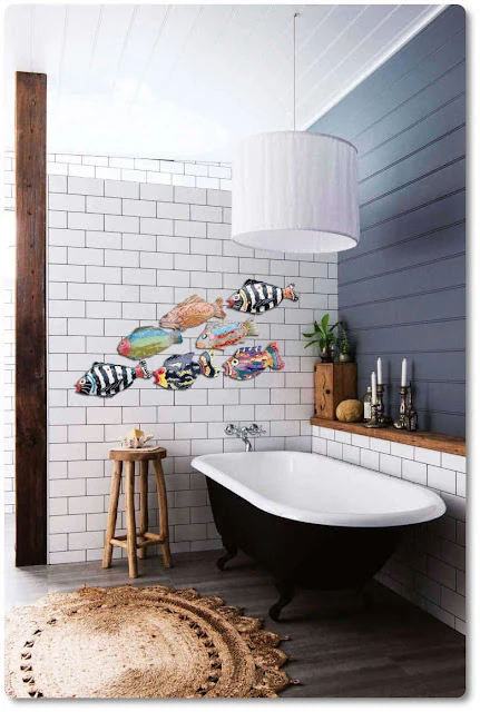 A neutral color wall is the perfect place for colorful fish decor
