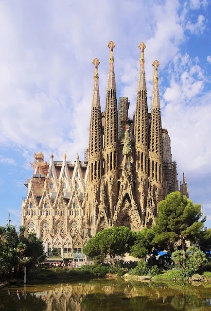 View of Sagrada Familia from Placa de Gaudi. The construction cranes have been digitally removed