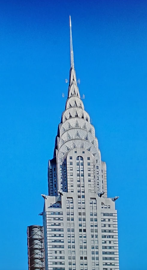 The Chrysler Building is an Art Deco skyscraper in the Turtle Bay neighborhood on the East Side of Manhattan, New York City, at the intersection of 42nd Street and Lexington Avenue near Midtown Manhattan - Artabys.com