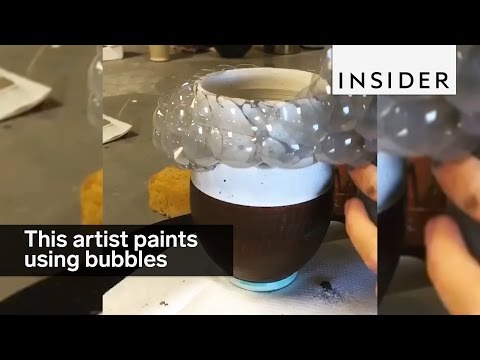 This artist paints her pottery with bubbles
