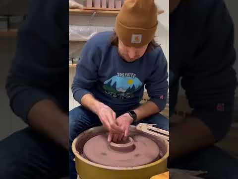 Throwing a basic cylinder on the pottery wheel