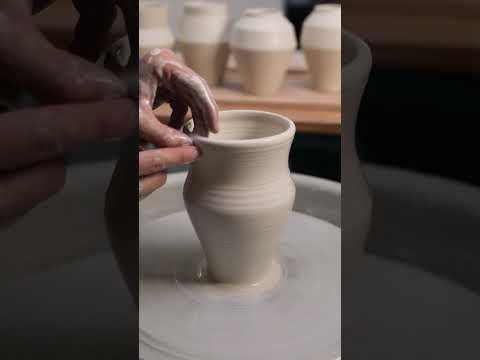 Throwing an Angular Porcelain Vase on the Potter's Wheel