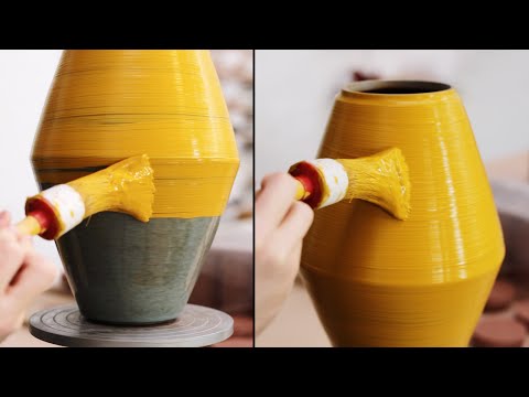 Painting A Pottery Jar With A Yellow Iron Ochre Slip